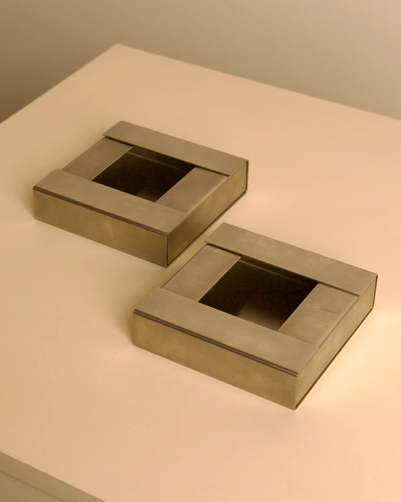 Pair of Italian brushed metal ashtrays by Fontana Arte, 1960s
