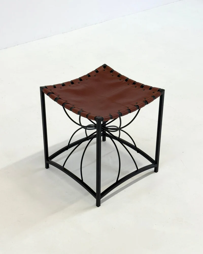 Elegant vintage French stool with black metal and brown leather