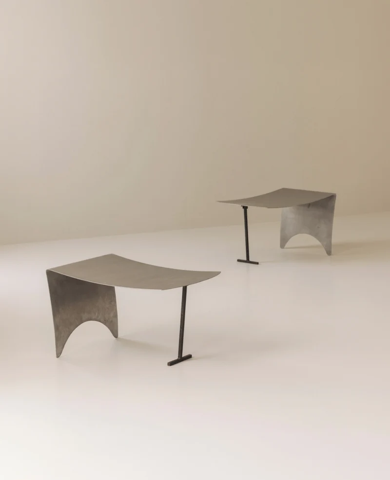 Set Modernist Curved Metal Stools from France, dating to the 1980s.