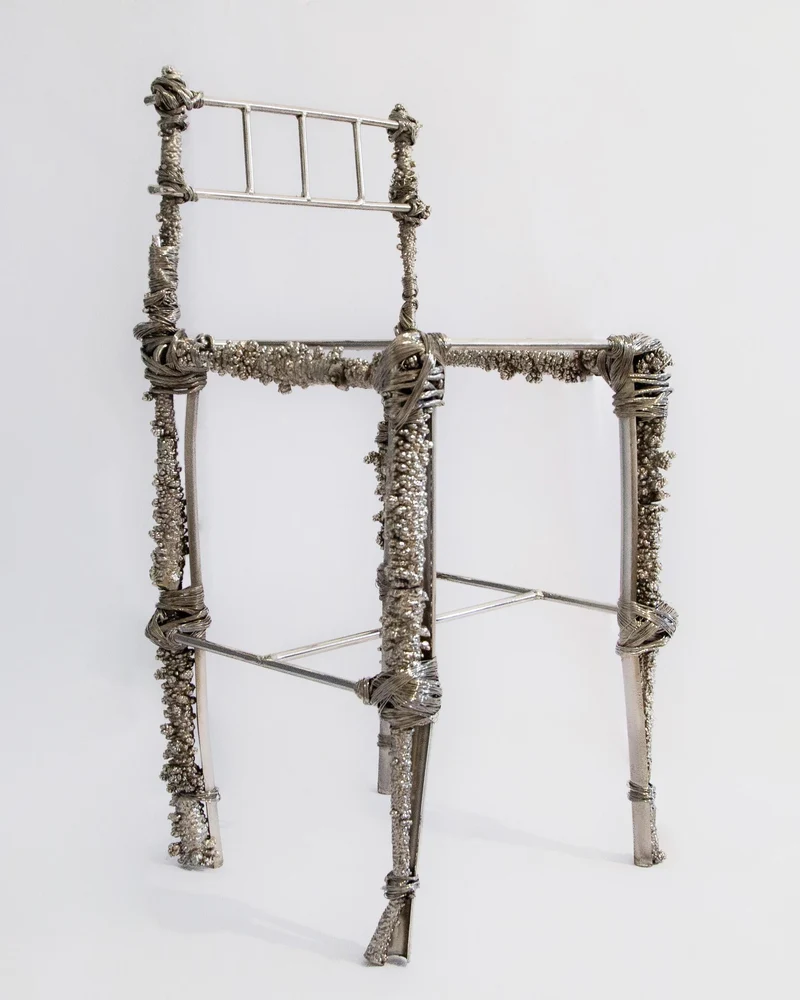 Fisherman Chair, Sculptural Chair in recycled nickel, chrome, copper, steel