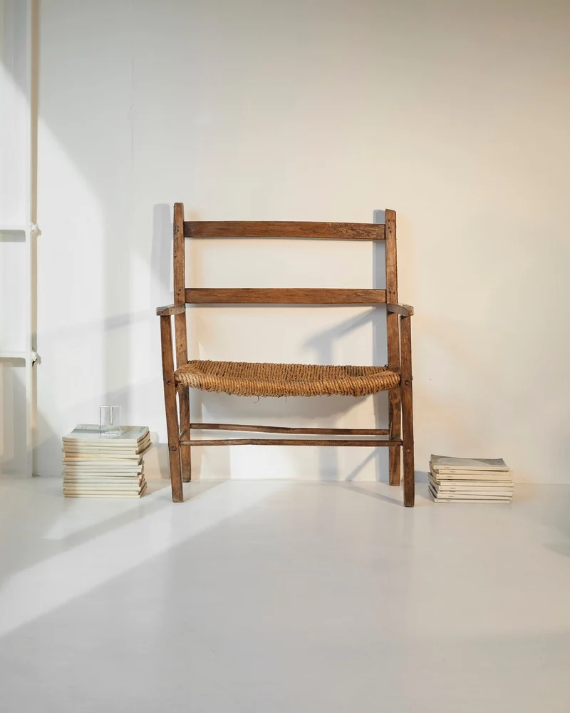 A French folk bench from the 19th Century. Wood and straw