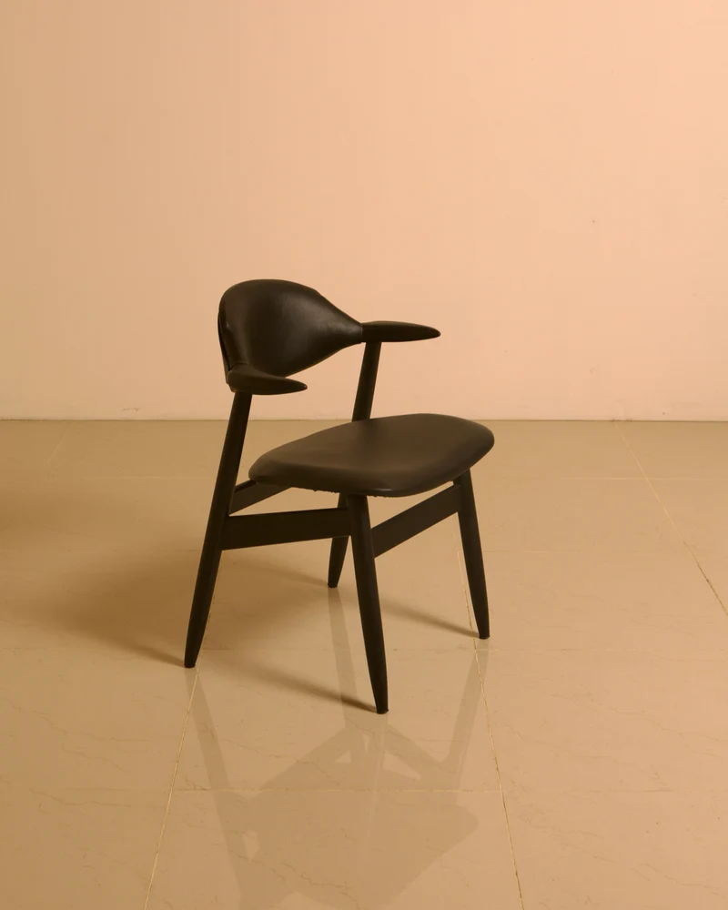 Dutch "Buffalo" armchair in wood and black leather, 1960s