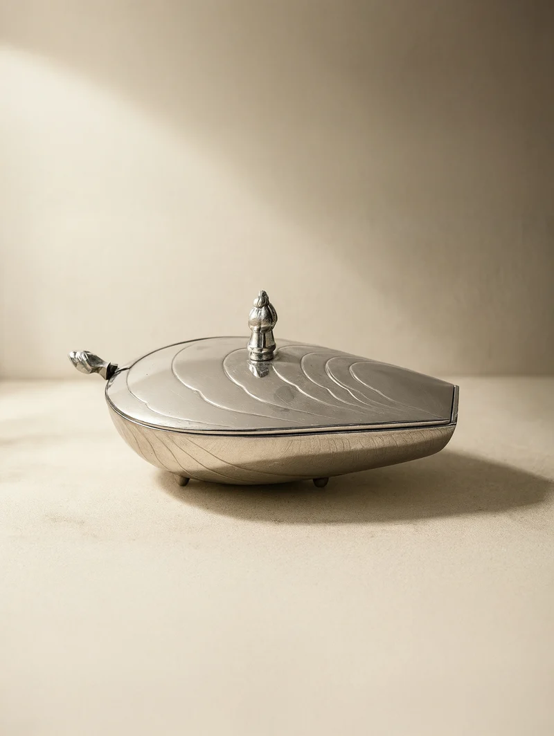 Silver plated caviar dish in oyster shape