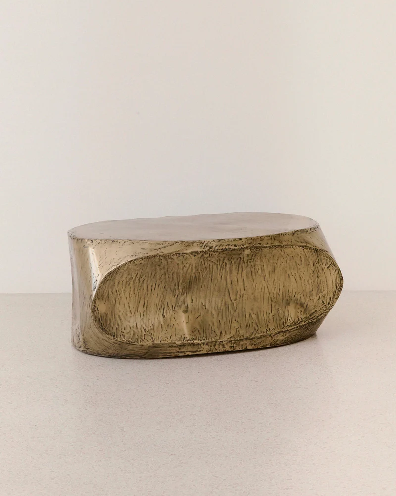 The ROCHER Medium Coffee Table in Brass Resin