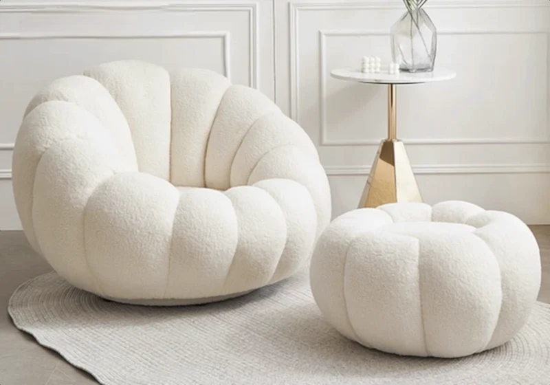 Fauteuil pivotant avec pouf en laine bouclée - Cozy