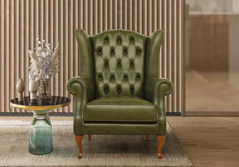 Fauteuil bergère vintage en cuir vert - Chesterfield